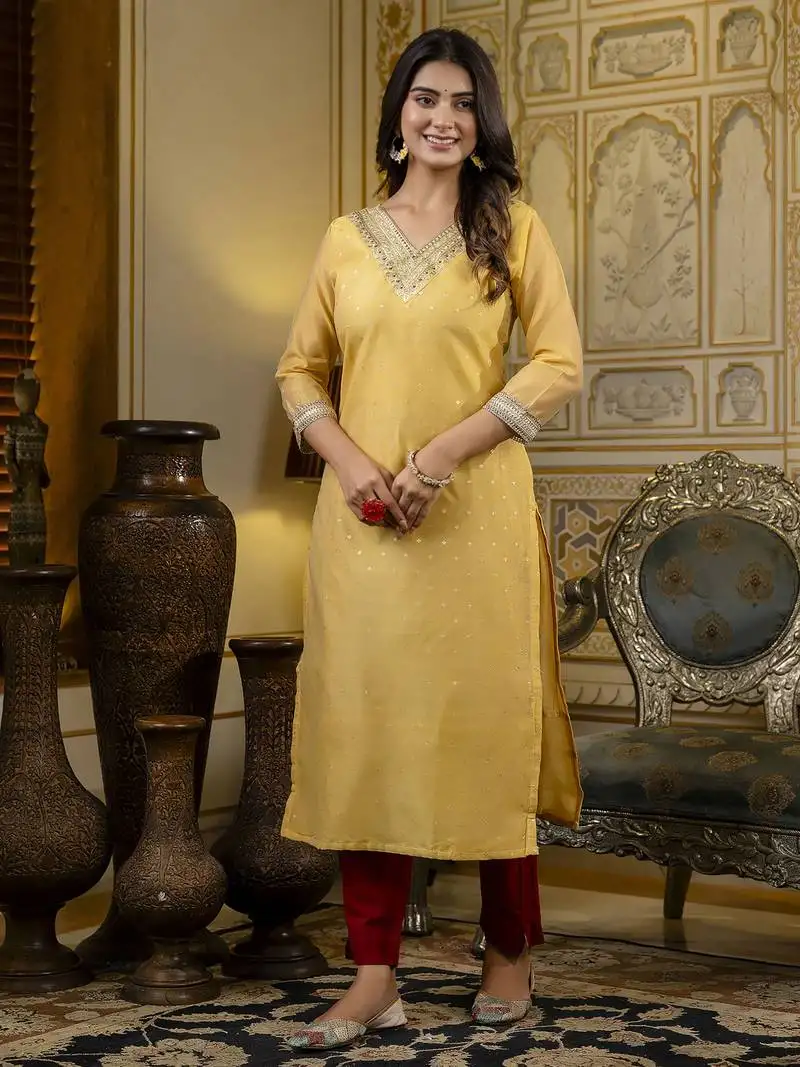 Yellow embroidered shimmer silk salwar suit