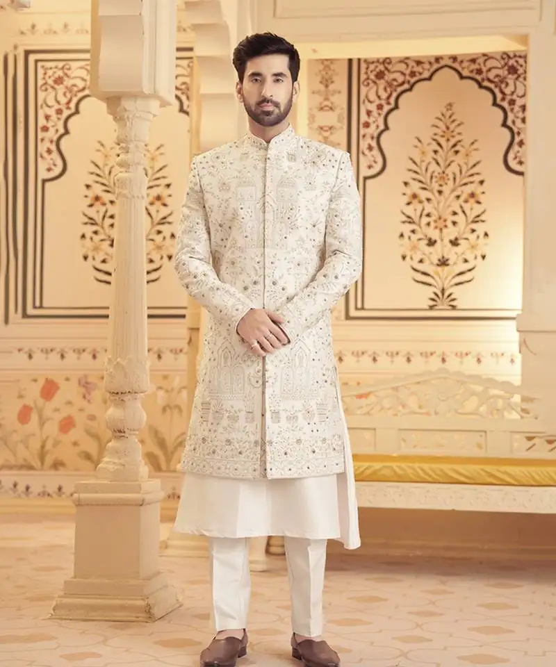 Lilac raw silk embroidered sherwani paired with kurta & pant