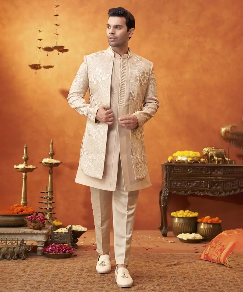 White raw silk embroidered jacket paired with sleeveless vest & pant