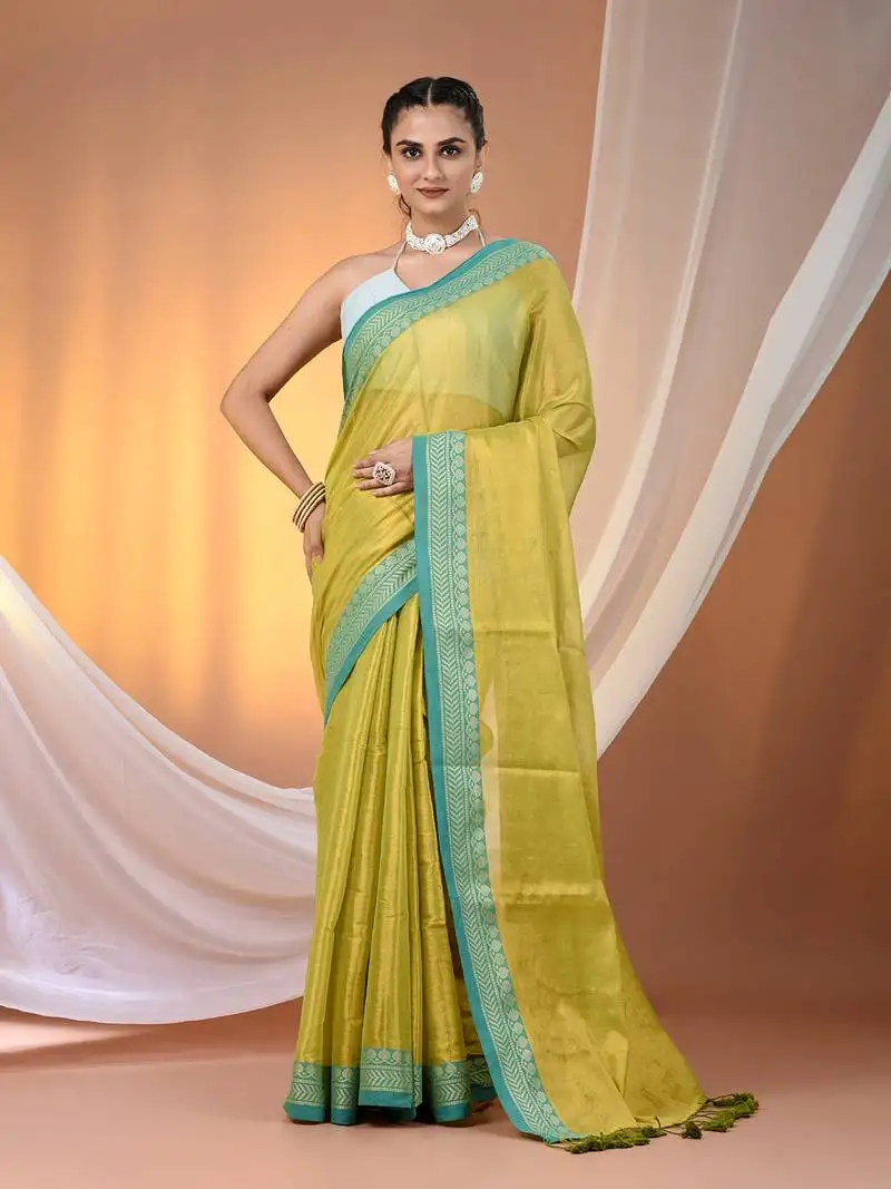 Lime green shimmer tissue saree with nakshi borders