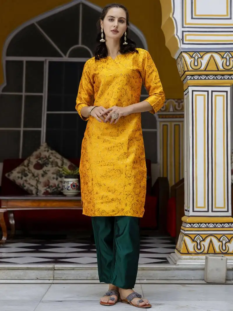 Yellow embroidered cotton silk self designed salwar suit