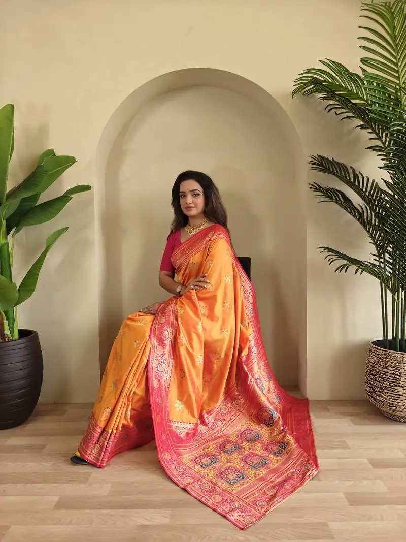 Orange banarasi silk blend saree with zari weaving meenakari design