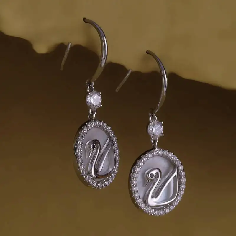 Embedded circle swan silver plated stud earring for women