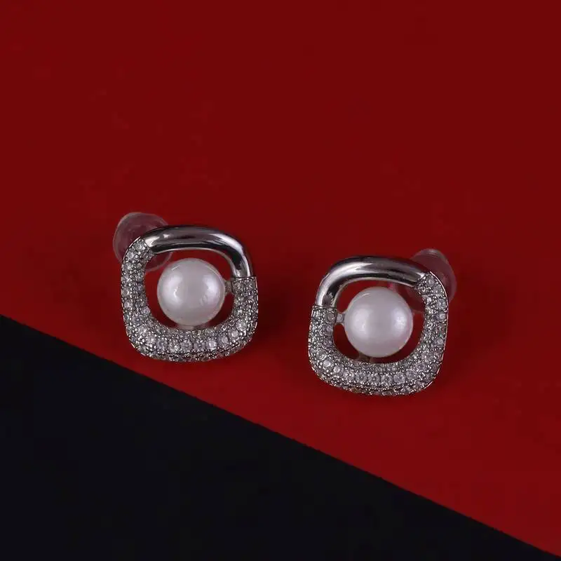 Lovely round shape pearl silver plated stud earring for women