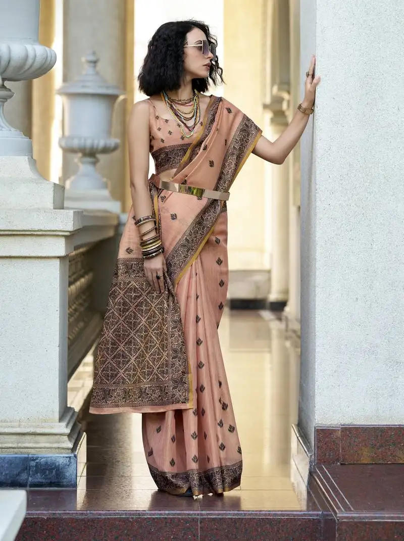 Peach tissue silk saree with unstitched blouse