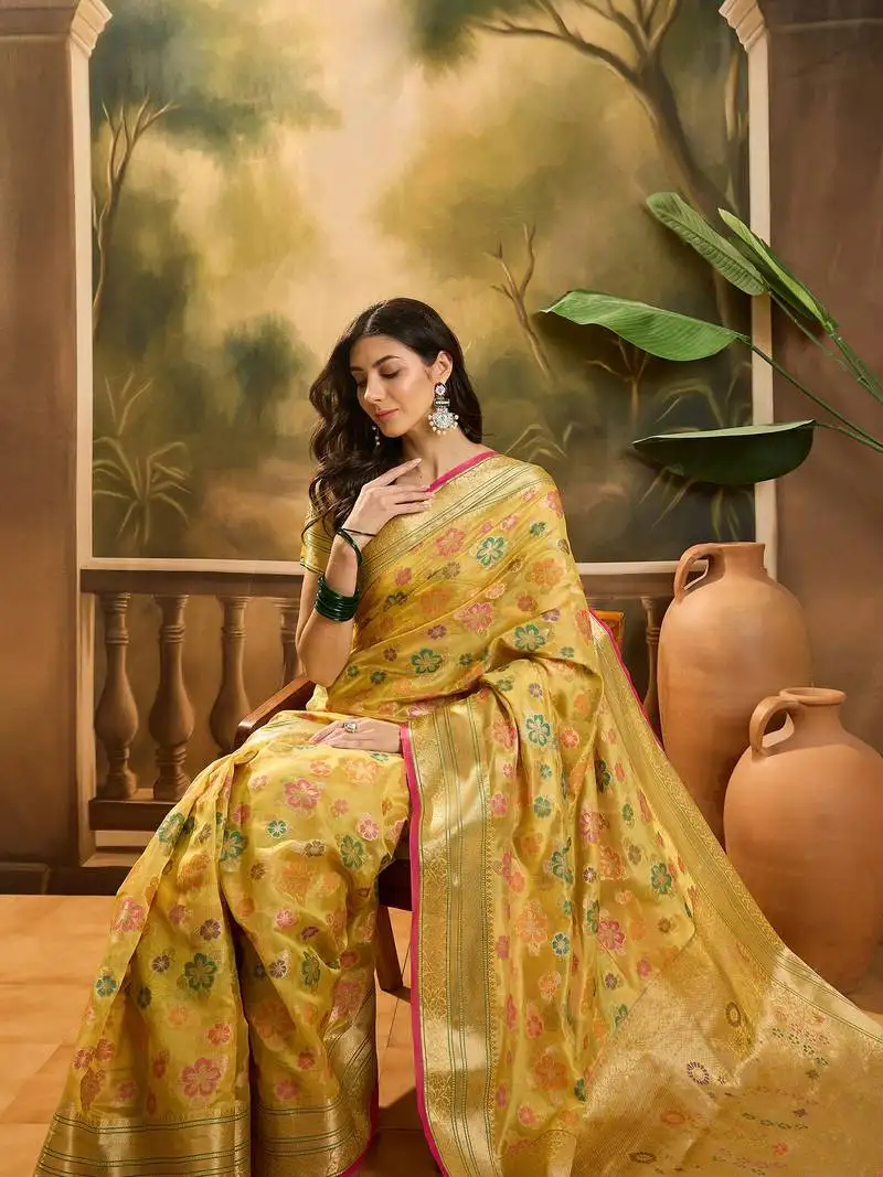 Women's gold organza zari woven saree with unstitched blouse piece