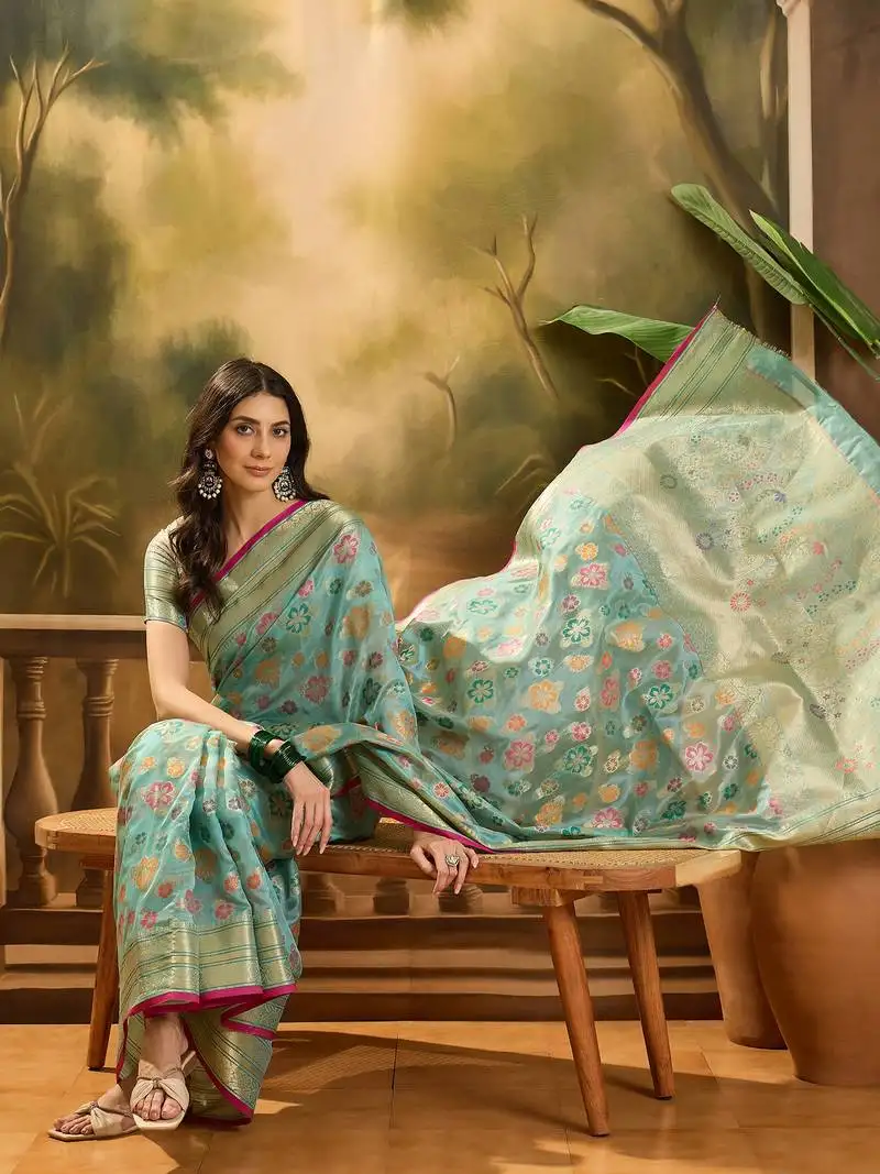 Women's sky organza zari woven saree with unstitched blouse piece