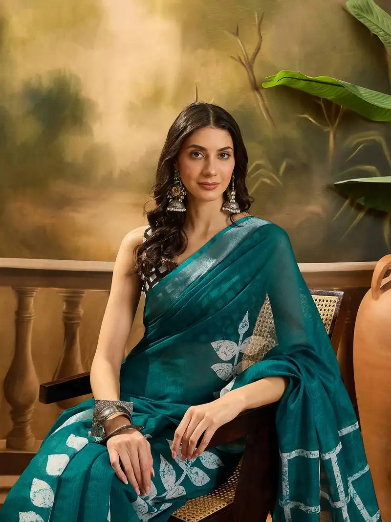 Women's teal linen printed saree with unstitched blouse piece