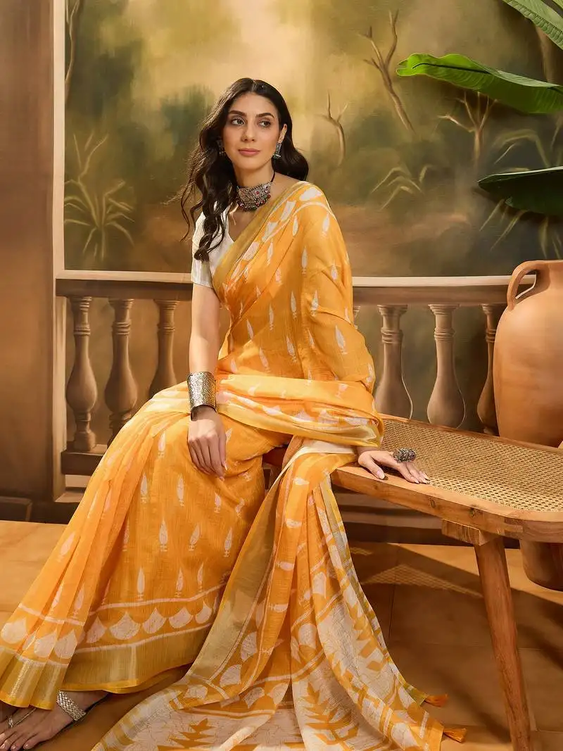 Women's orange linen printed saree with unstitched blouse piece