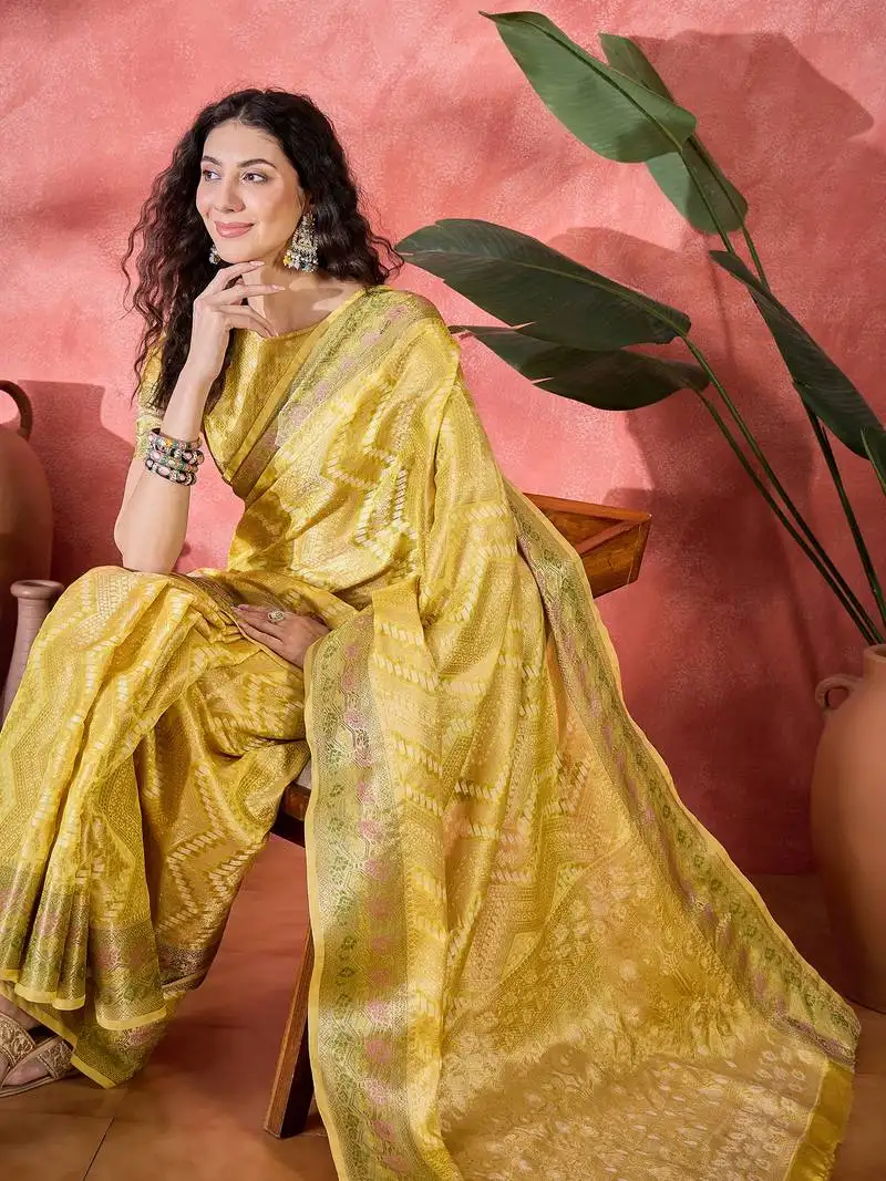 Women's yellow silk blend rangkat bandhani work saree with unstitched blouse piece