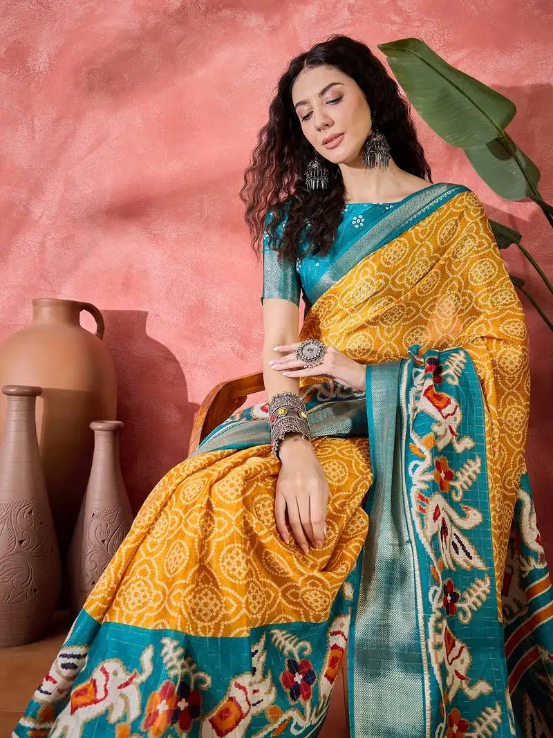 Women's mustard silk blend bandhani work saree with unstitched blouse piece