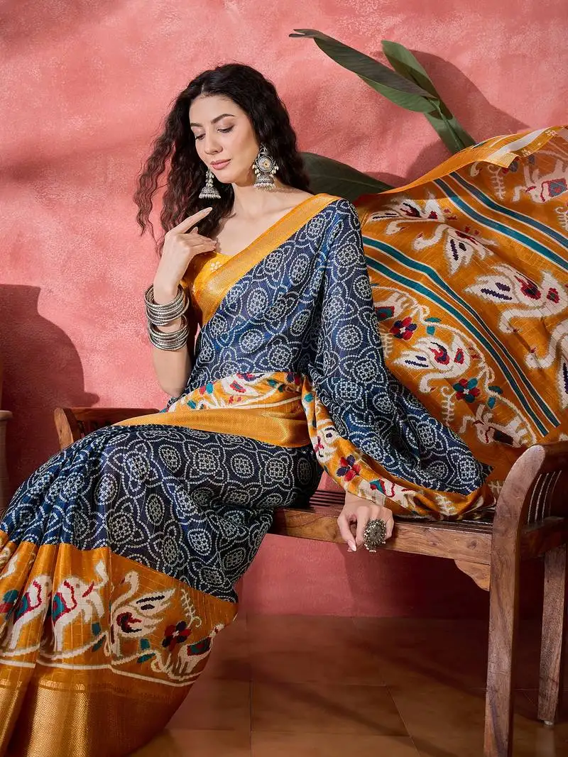 Women's navy blue silk blend bandhani work saree with unstitched blouse piece