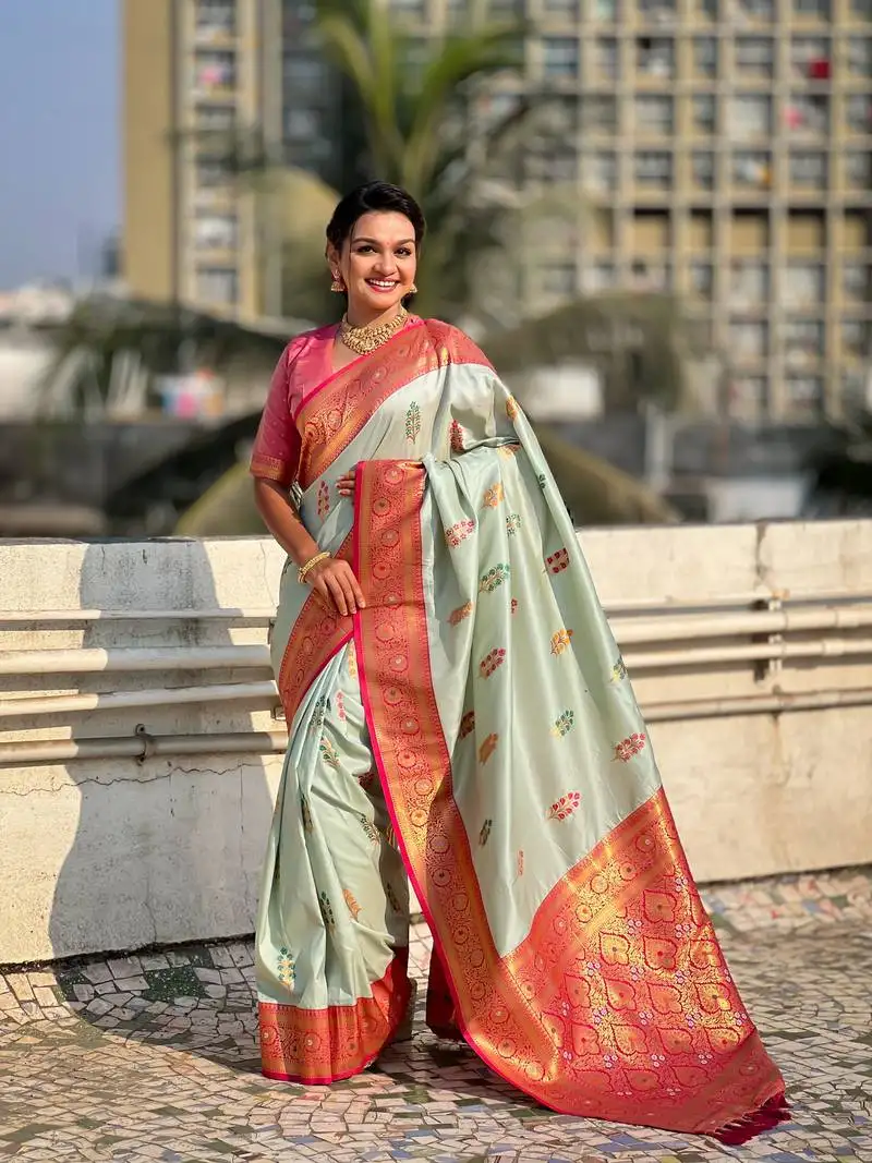 Sea green soft silk blend woven meenakari designer saree