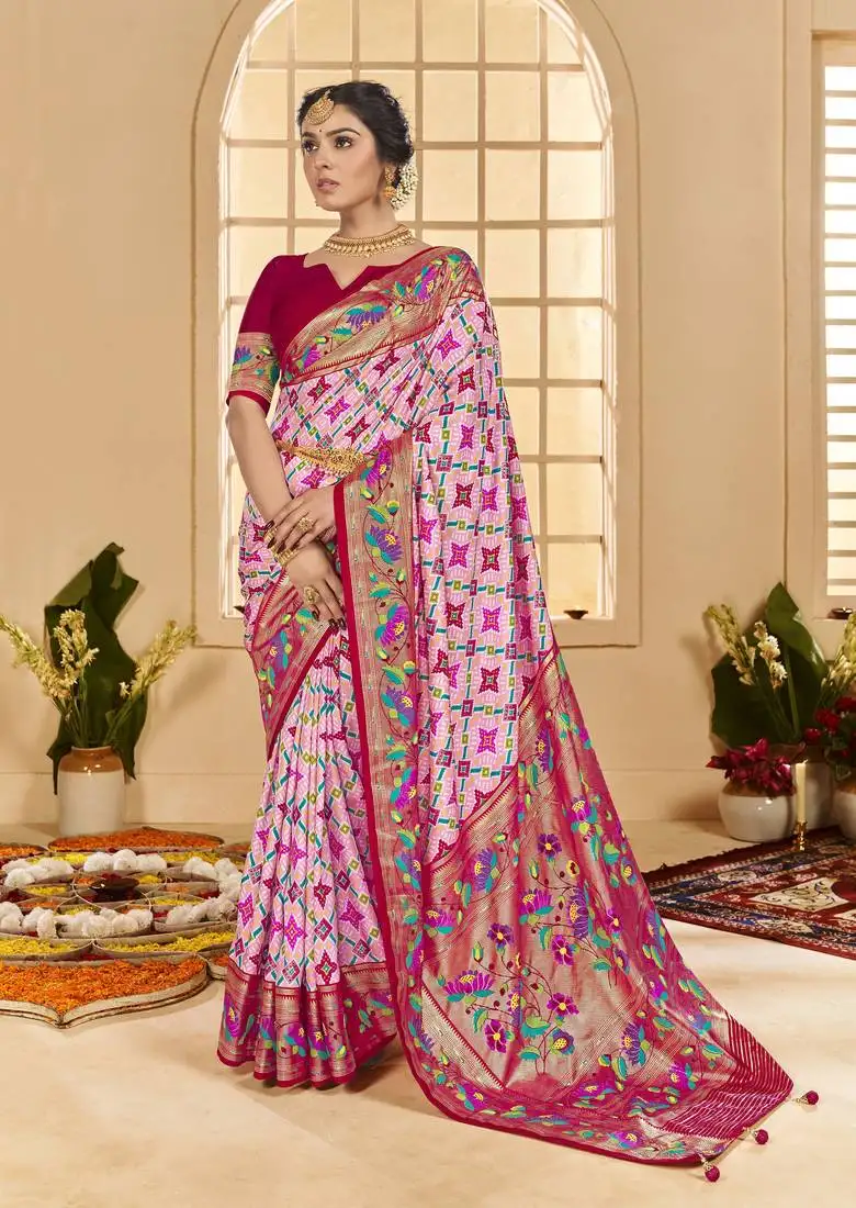 Baby pink woven border with ikkat printed cotton silk blend saree