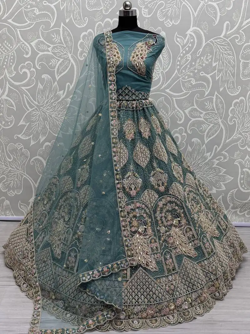 Teal blue net wedding wear lehenga choli with dupatta