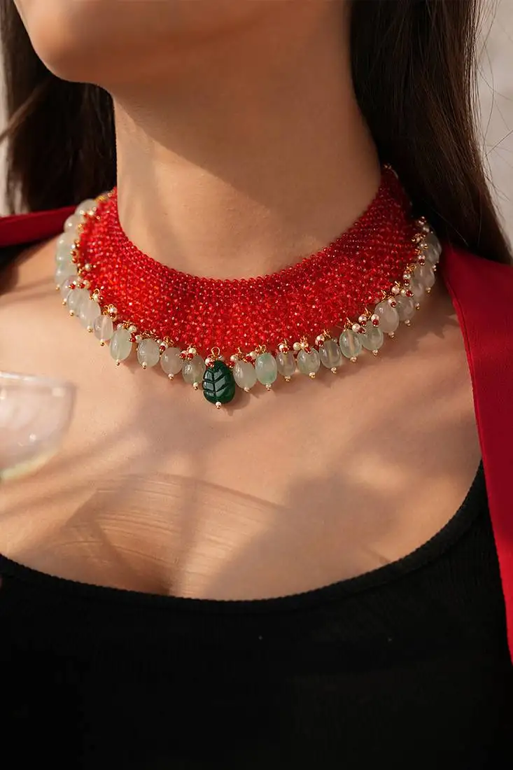 Manika red beaded necklace with semi-precious green stones