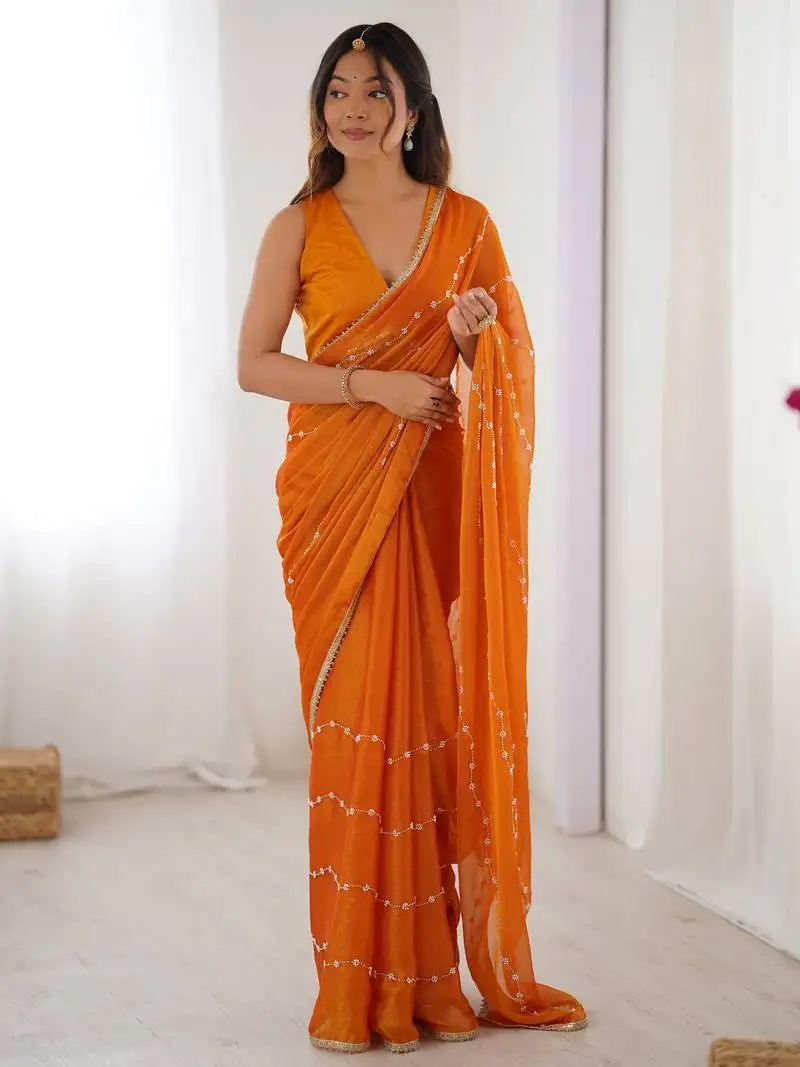 Glamorous orange sequins sangeet wear saree with blouse