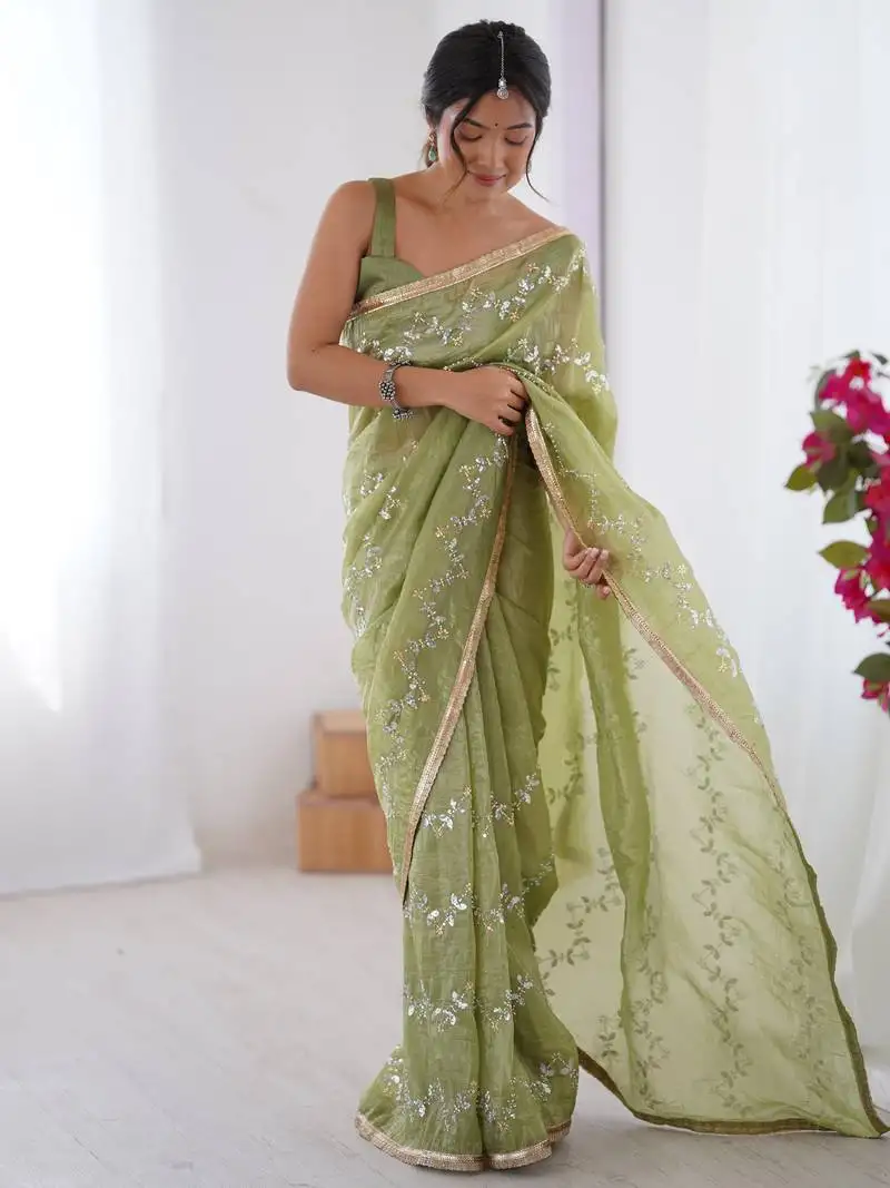 Adorable pista green sequins organza saree with blouse