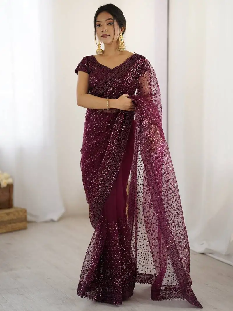 Glamourous wine sequins net festival wear saree with blouse