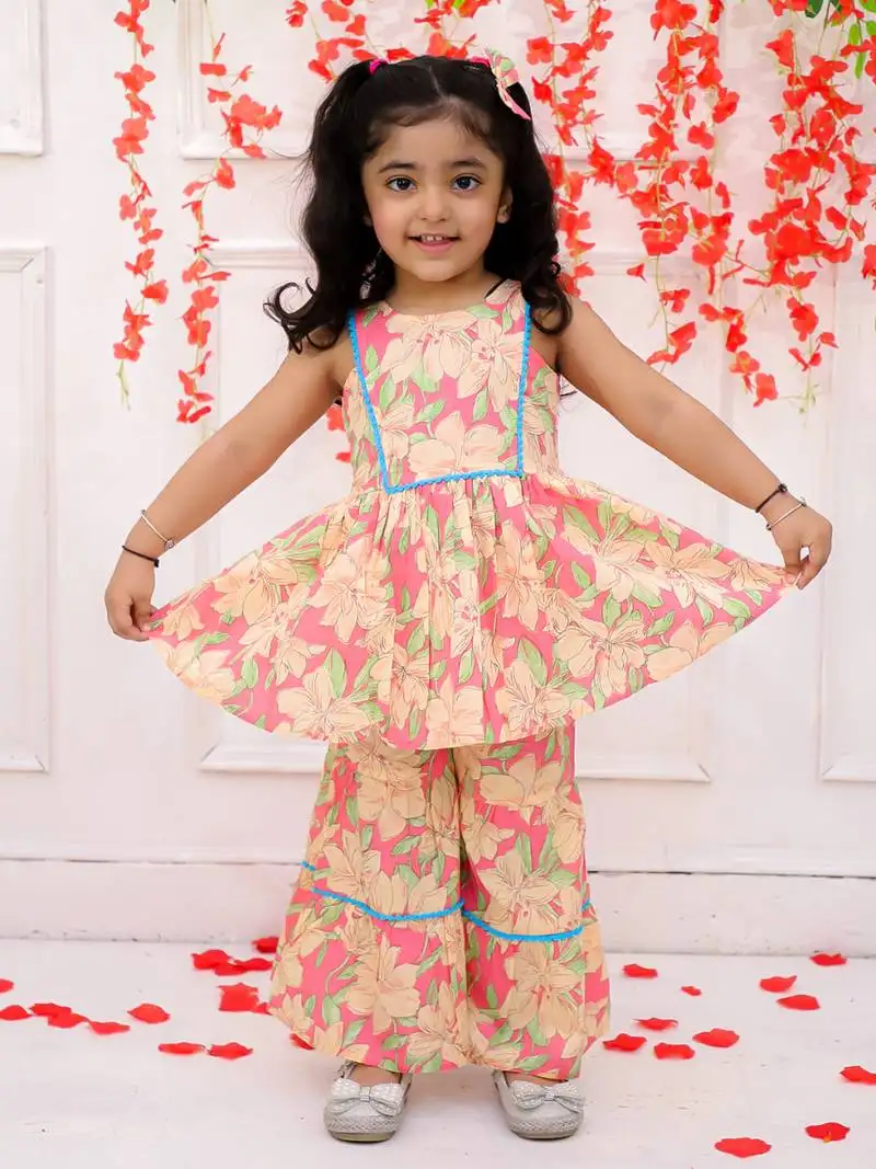 Pink printed cotton kurti and sharara with bow-clip for girls