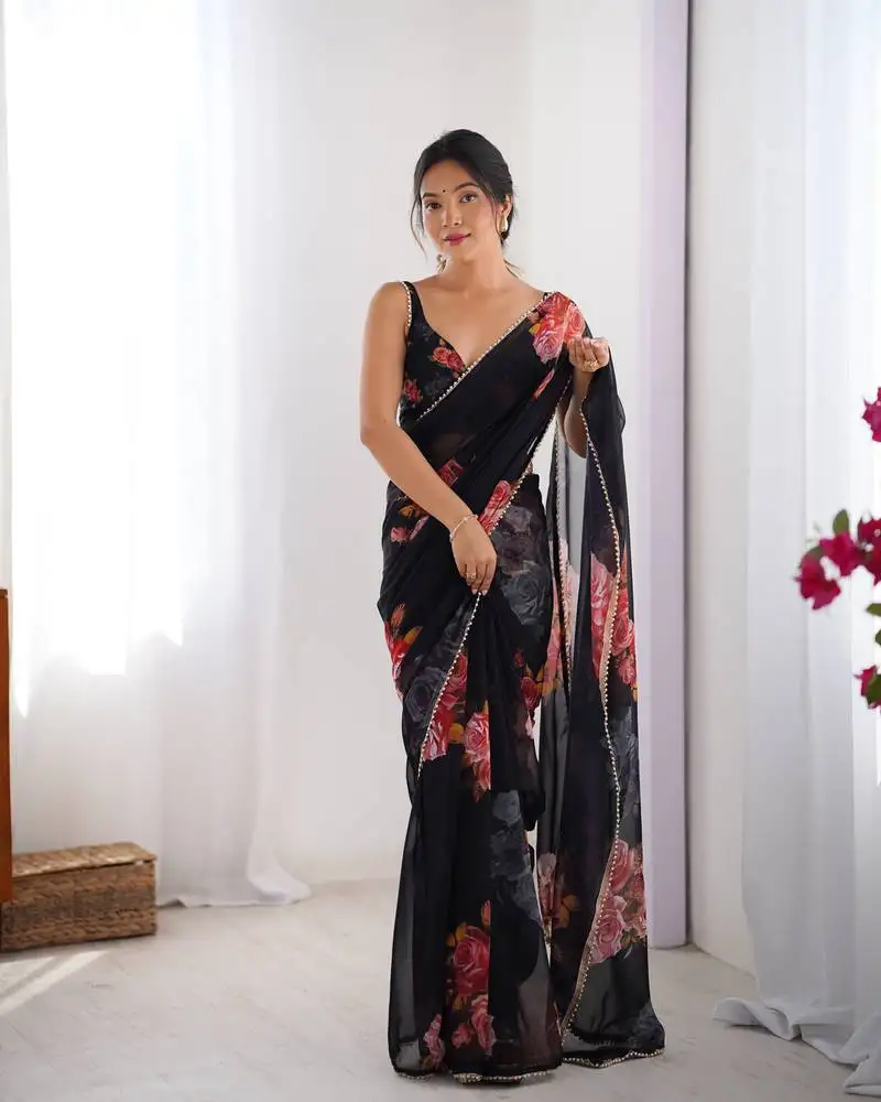 Black georgette saree with hand print and moti lace border