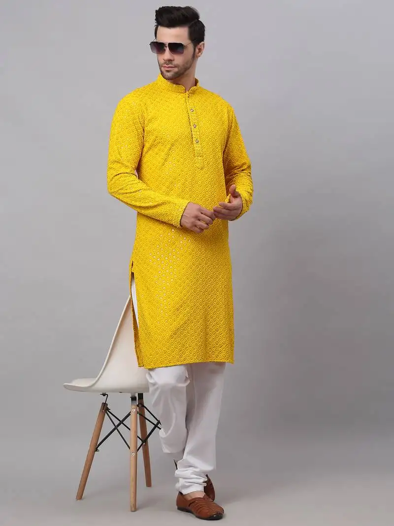 Yellow chikankari embroidered and sequin kurta with churidar