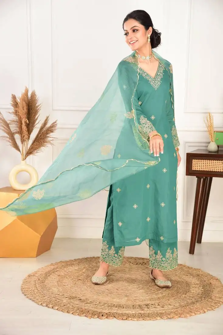 Beautiful pine green ceremonial dress with designer embroidered work work on viscose chanderi fabric