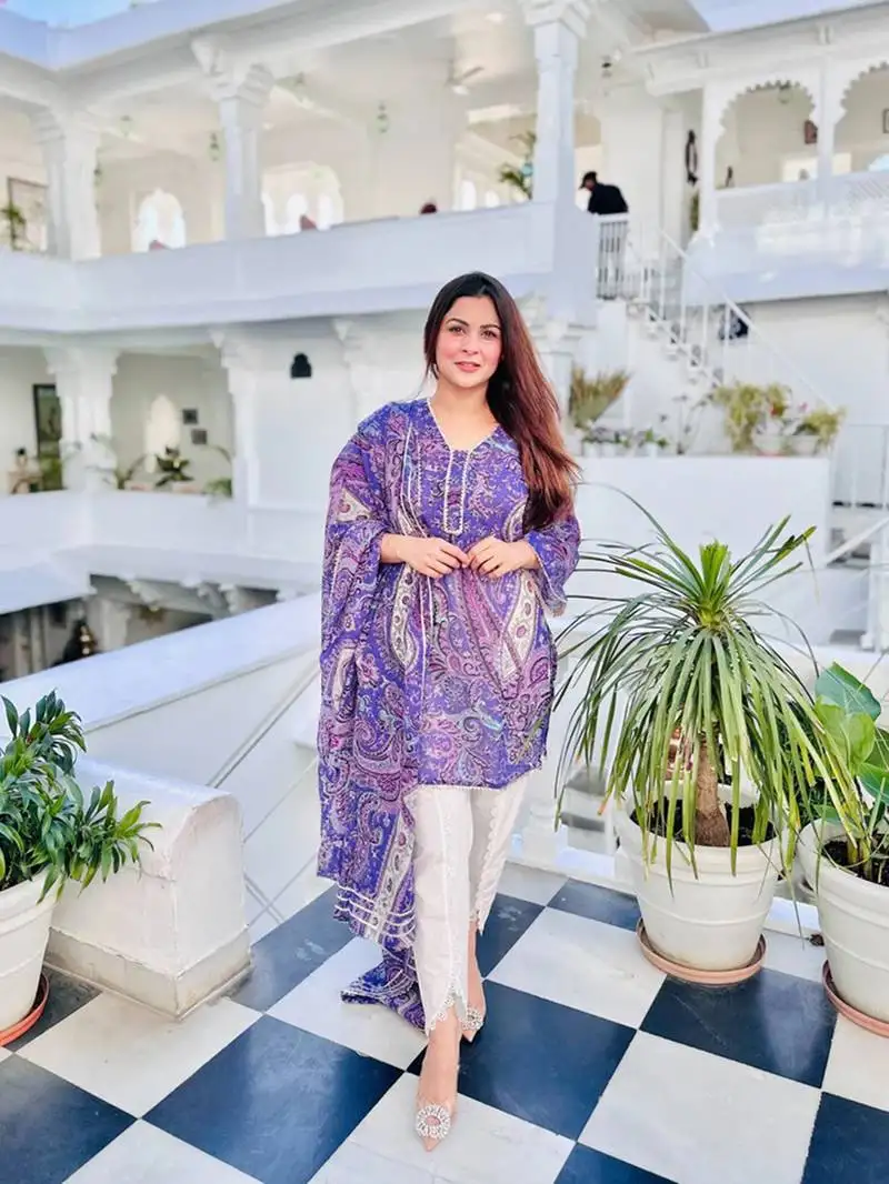 Beautiful purple ceremonial dress with designer printed work on viscose fabric