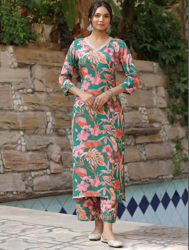 Beautiful green ceremonial dress with designer printed work on viscose fabric