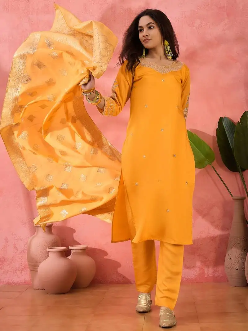Yellow roman silk suit designed with embroidery work and wevon designer