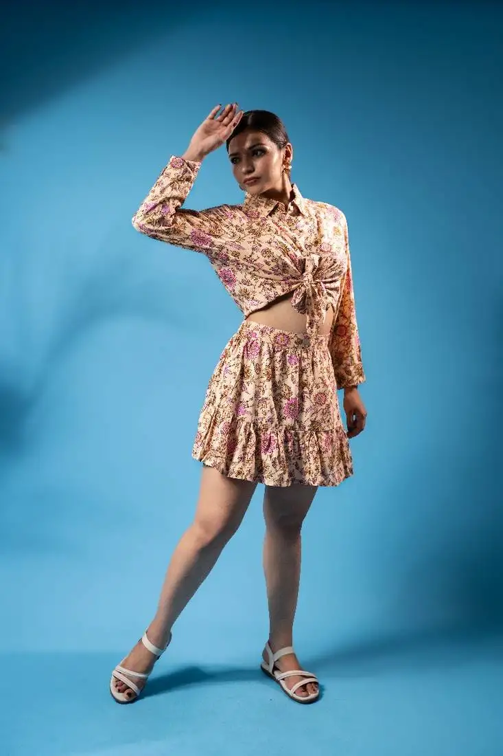 Peach puff floral crop top and ruffled skirt set