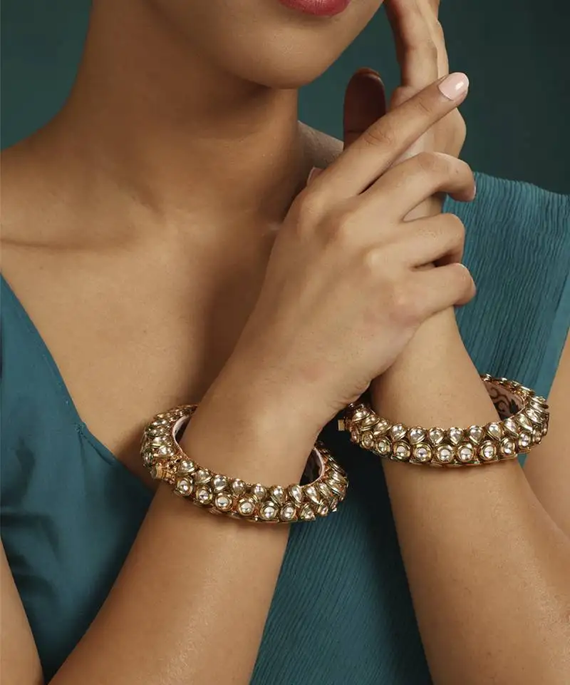Gold kundan bangles and bracelets