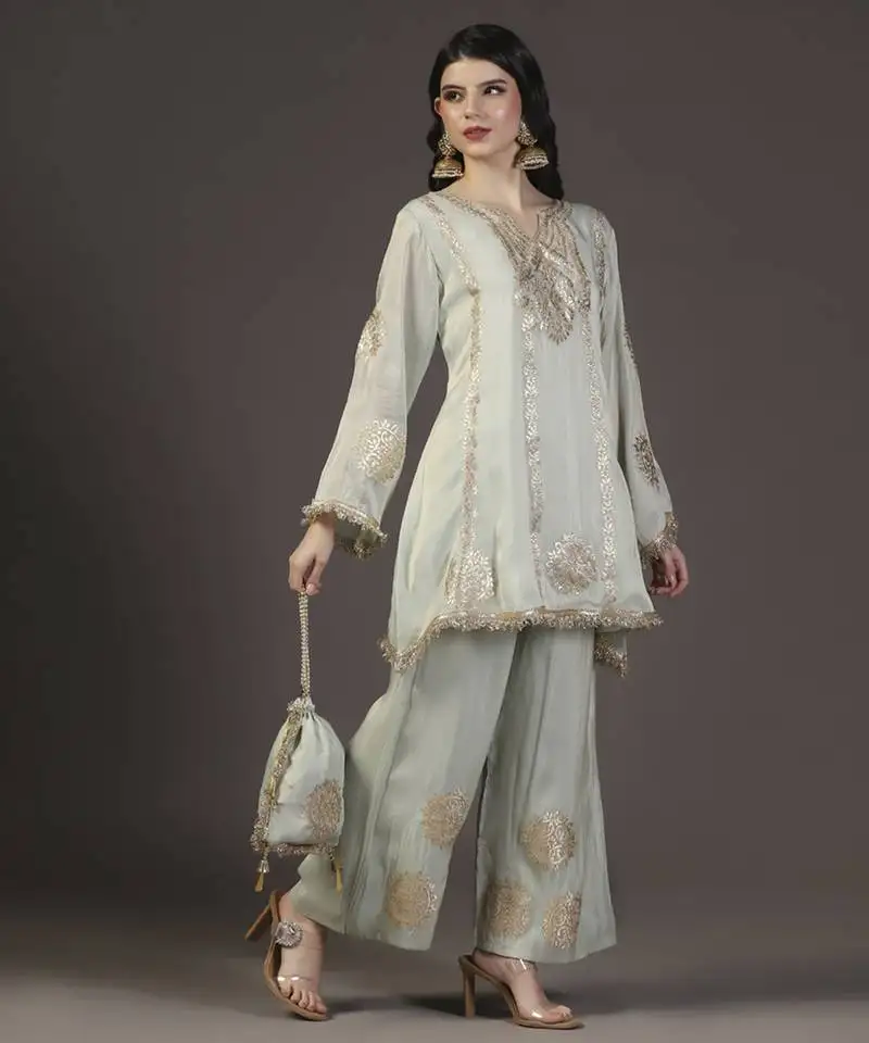 Mystic green leather applique and neem zari hand embroidered tissue kurta sets of 3