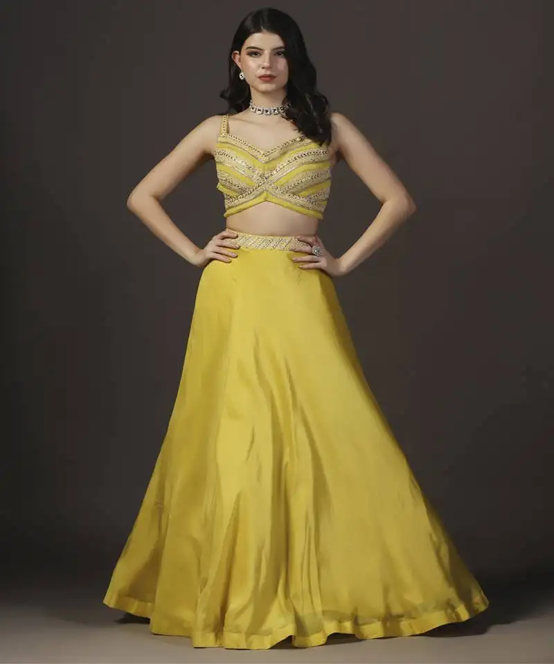 Yellow genda-phool haldi silk embroidered lehenga sets of 3