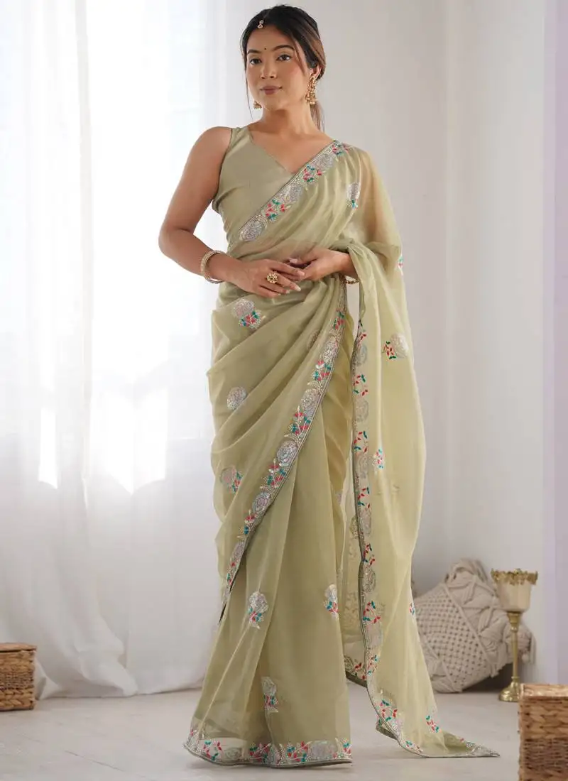 Beige organza embroidered party wear saree