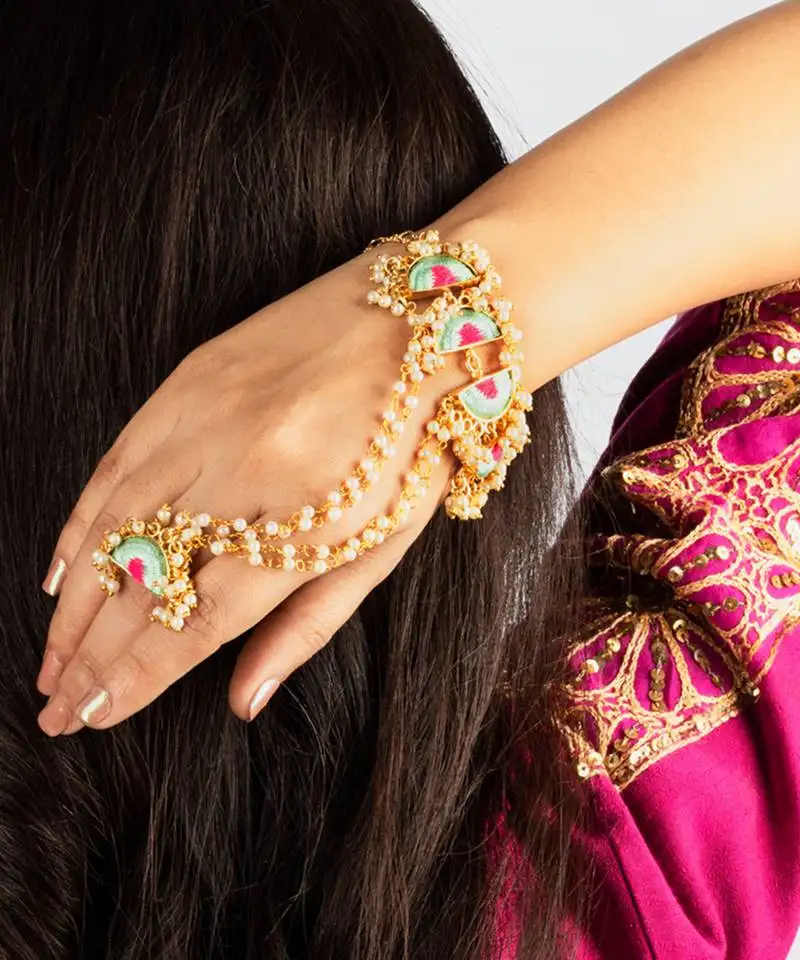 Mint wave haathphool in silk thread embroidery for pre-wedding occasions.