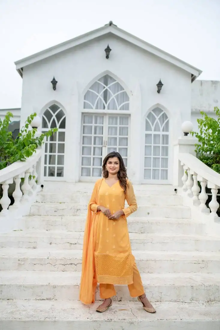 Light orange thread work kurta set