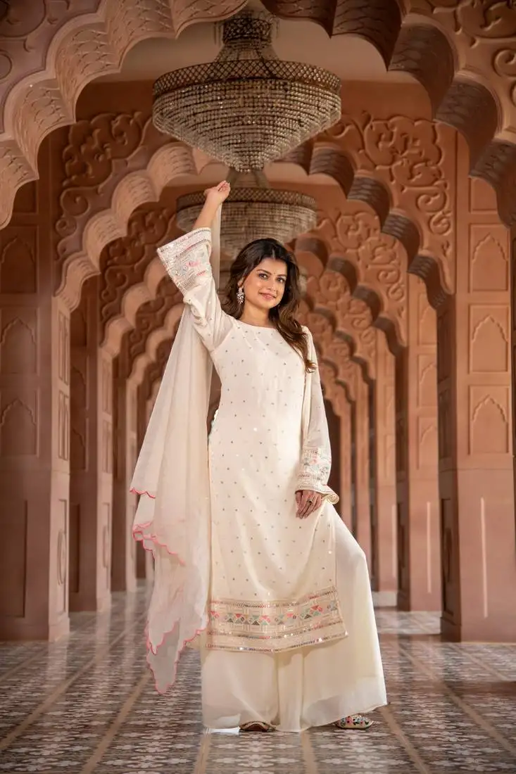 Cream multi color thread work kurta with pallazzo set