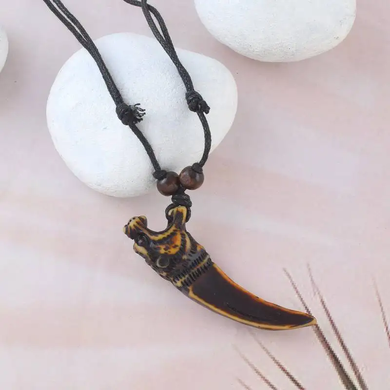 Polyresin tiger mouth horn pendant