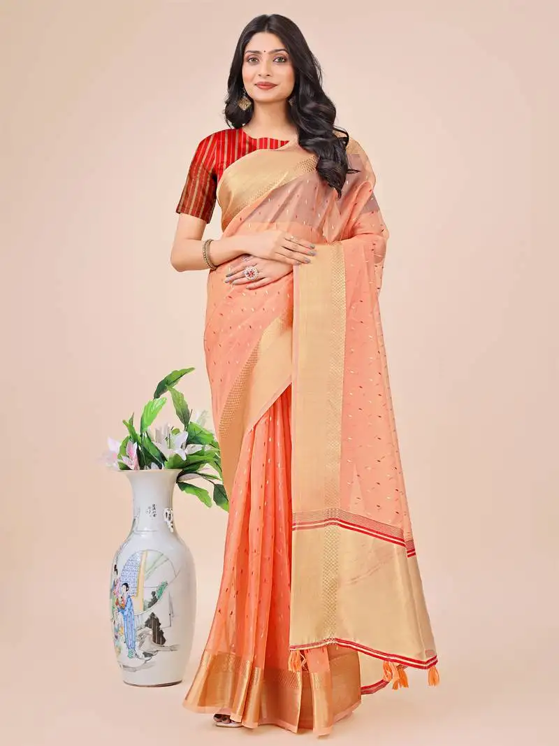 Peach organza woven zari work tassel saree