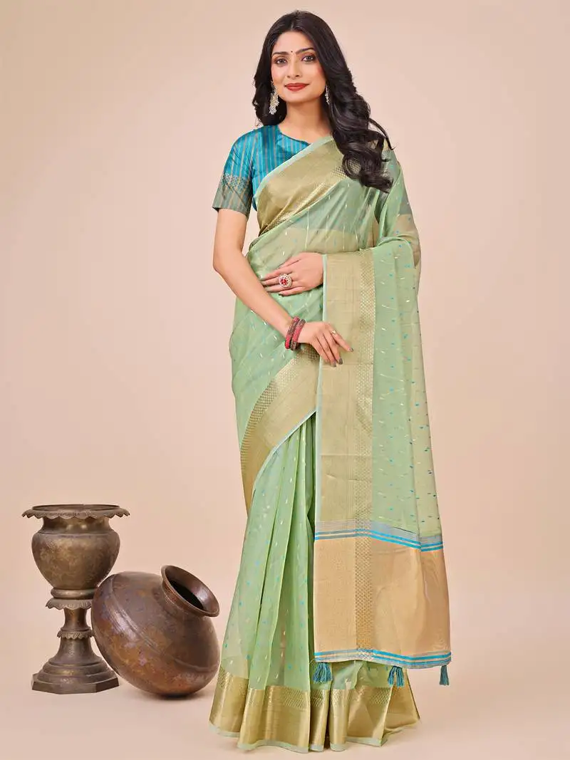 Green organza woven zari work tassel saree
