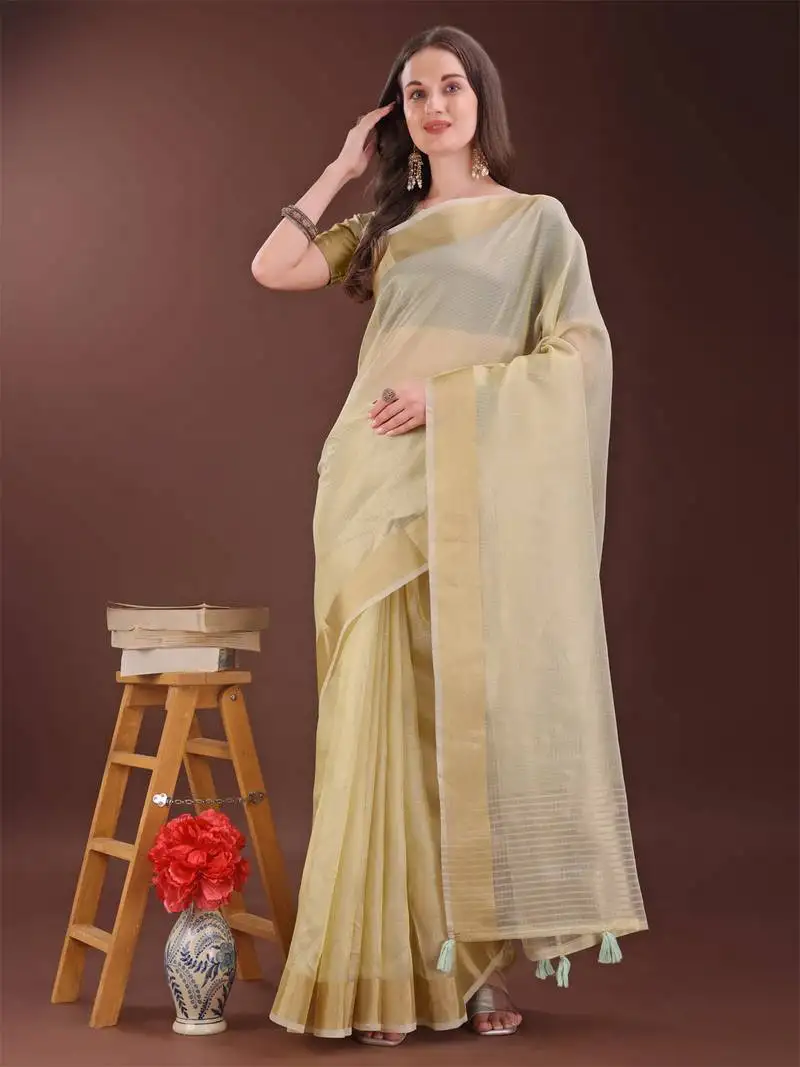 Light yellow organza woven zari work tassel saree
