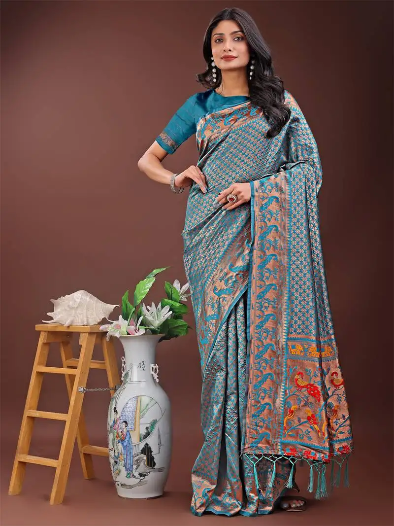 Sea green silk blend woven zari work tassel saree