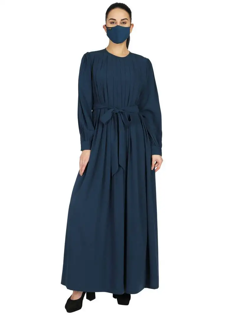 Teal abaya with multiple pleats and belt. comes with a matching hijab.