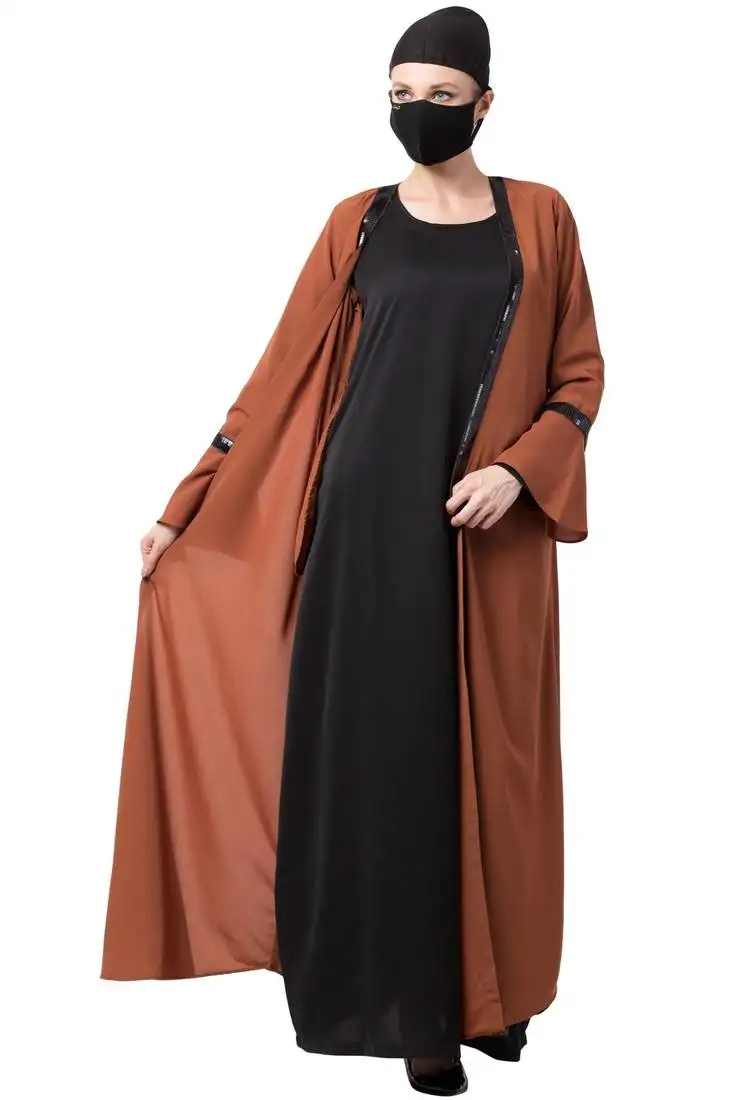 Black two piece combo of abaya and a cardigan.