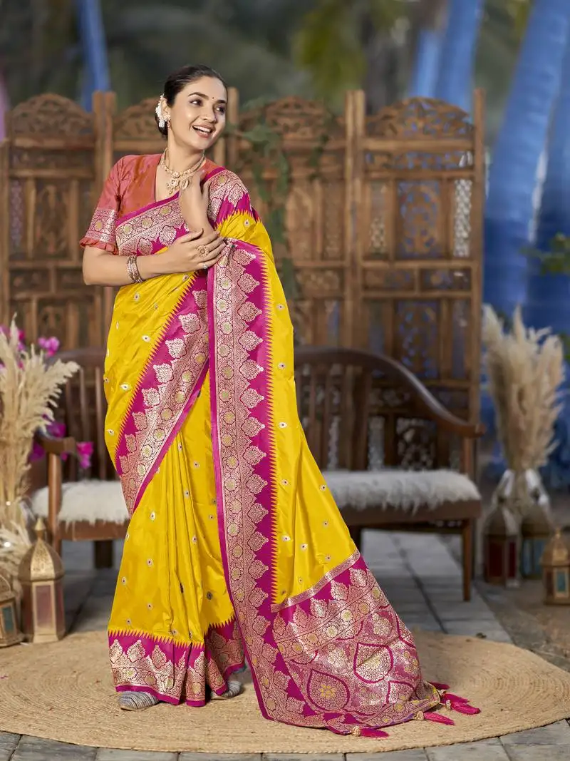 Banarasi woven yellow and pink saree with heavy jacquard work