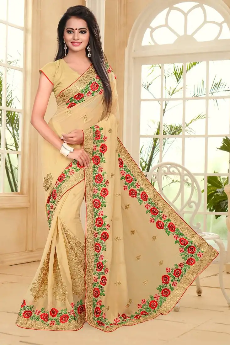 Beige embroidered border georgette saree with matching blouse piece