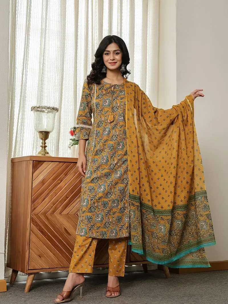 Mustard yellow floral a-line kurta trouser dupatta set with lace work