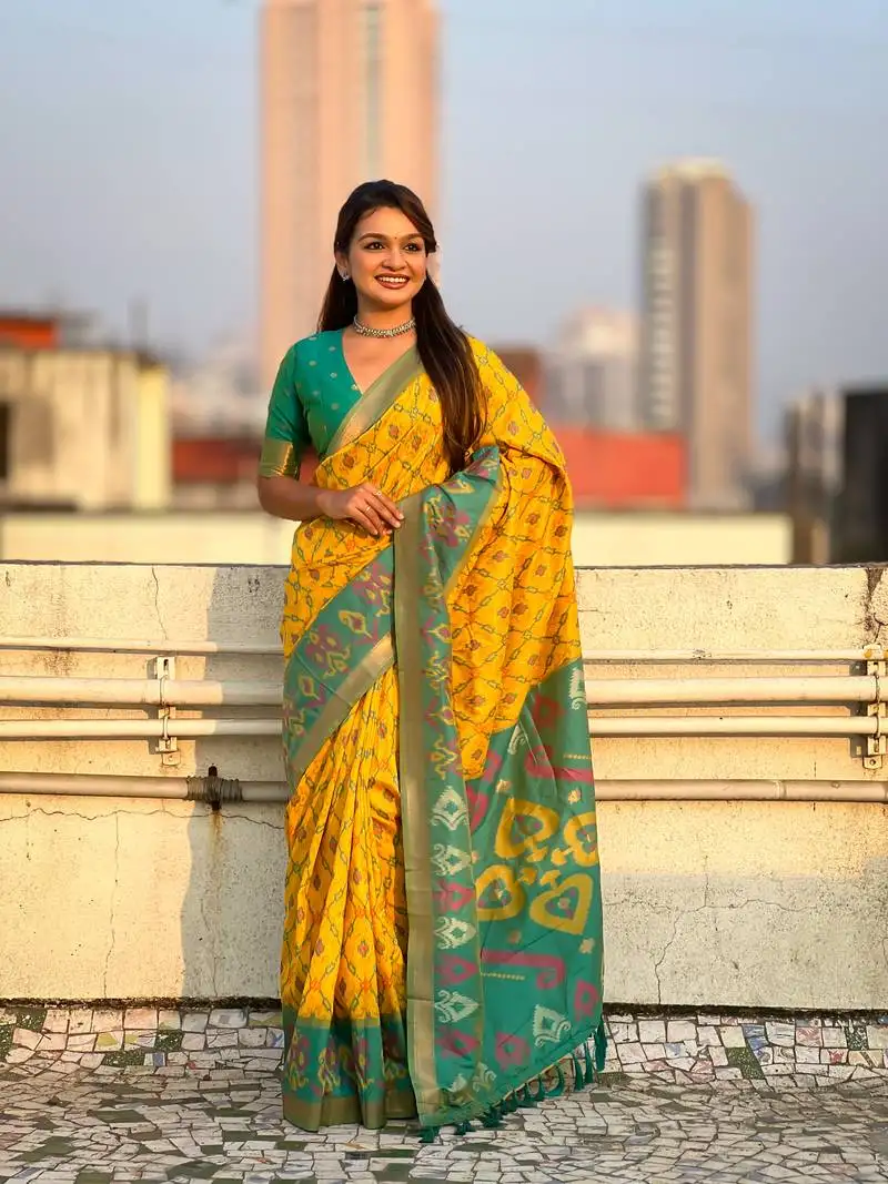 Yellow soft silk blend zari woven patola saree with contrast weaves