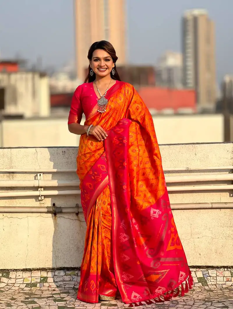 Orange soft silk blend zari woven patola saree with contrast weaves
